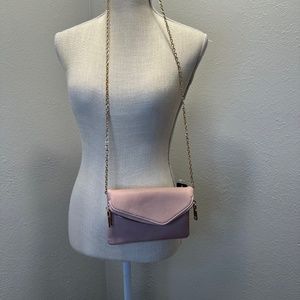 Pink crossbody purse with gold strap